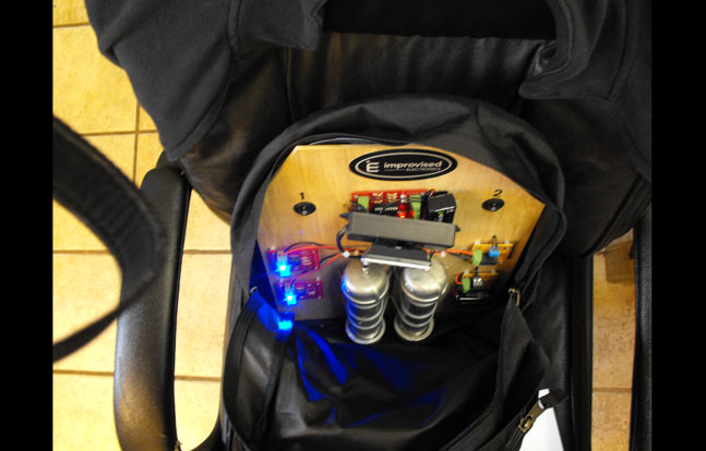 This improvised electronics bomb simulator makes use of visual and audial cues if an EOD trainee inadvertently sets it off while trying to disarm it.