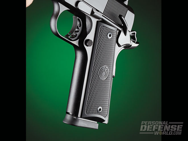 The Expert 1911 features checkered polymer grip panels and a left-side-mounted safety.