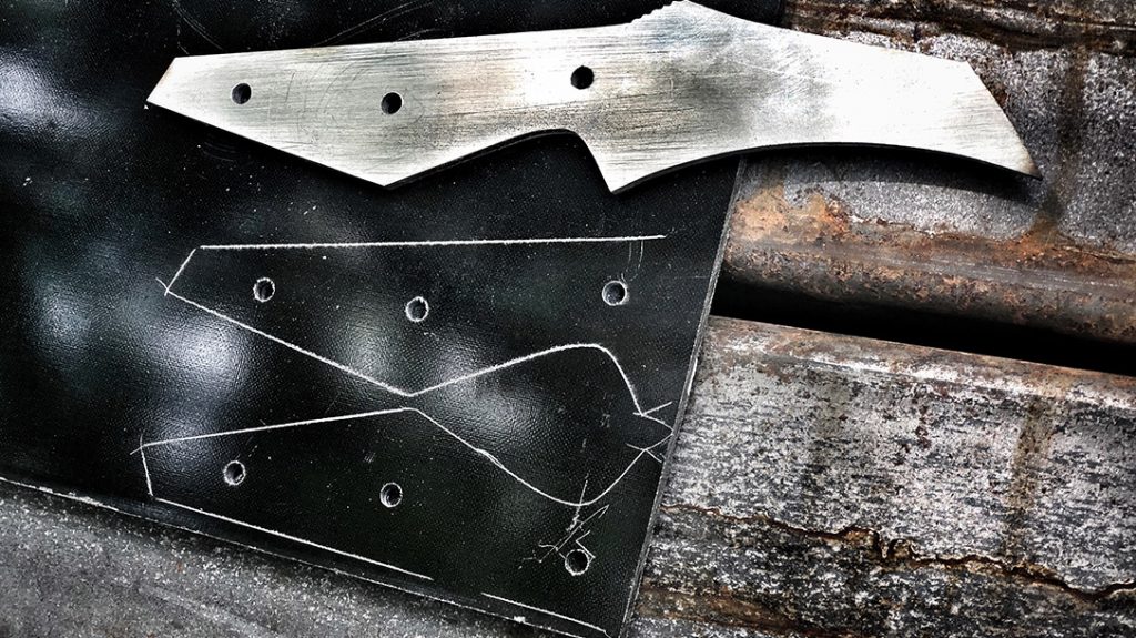 They then traced the handle onto a piece of black linen Micarta, creating the pre-shaped handle scales.