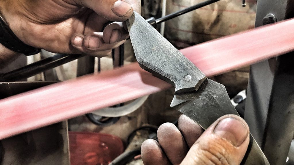 The handle scales were then cleaned up and shaped/contoured, for better self-defense EDC, on the belt sander.
