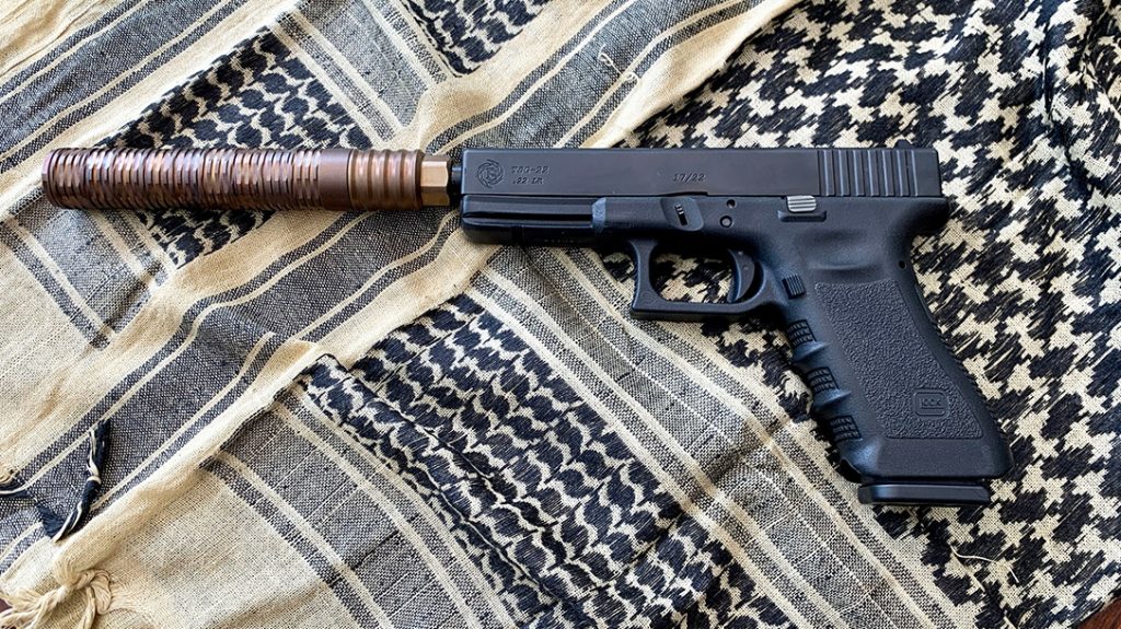 A Tactical Solutions Glock 17/22 with the MG22 Extreme Duty .22 LR suppressor.