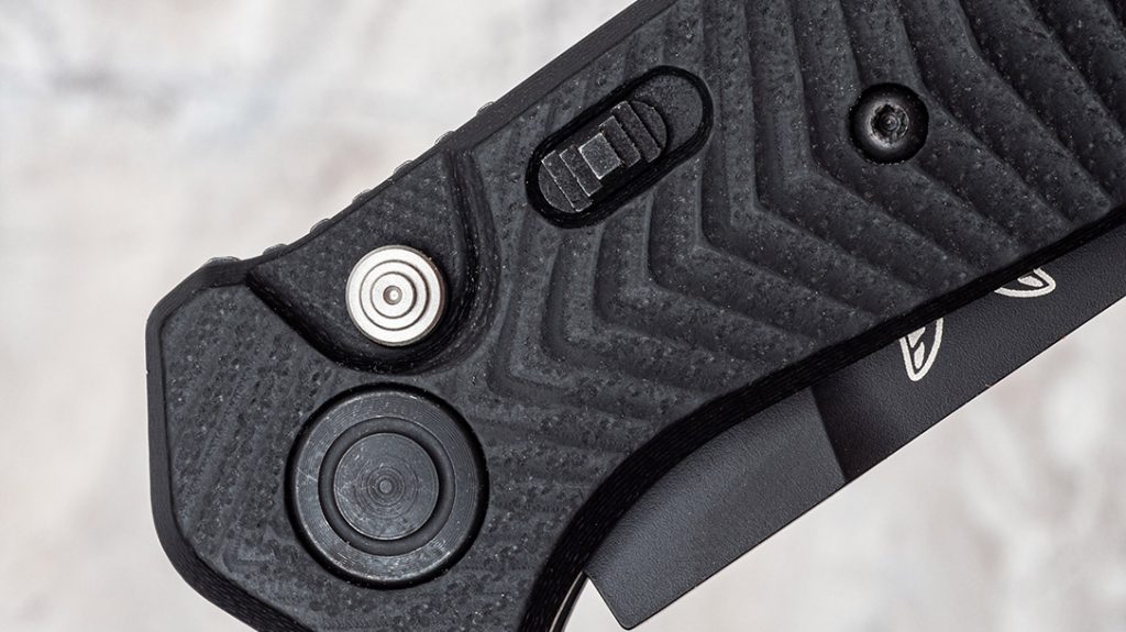 Though the Mediator’s push button is recessed nicely, the knife still offers up a safety switch for two-way security.