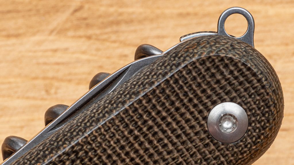 The MKM Malga includes a keyring/lanyard hole for pocket carry.