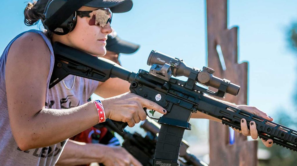 Lena Miculek runs a secondary reflex optic, mounted at a 45-degree angle. 