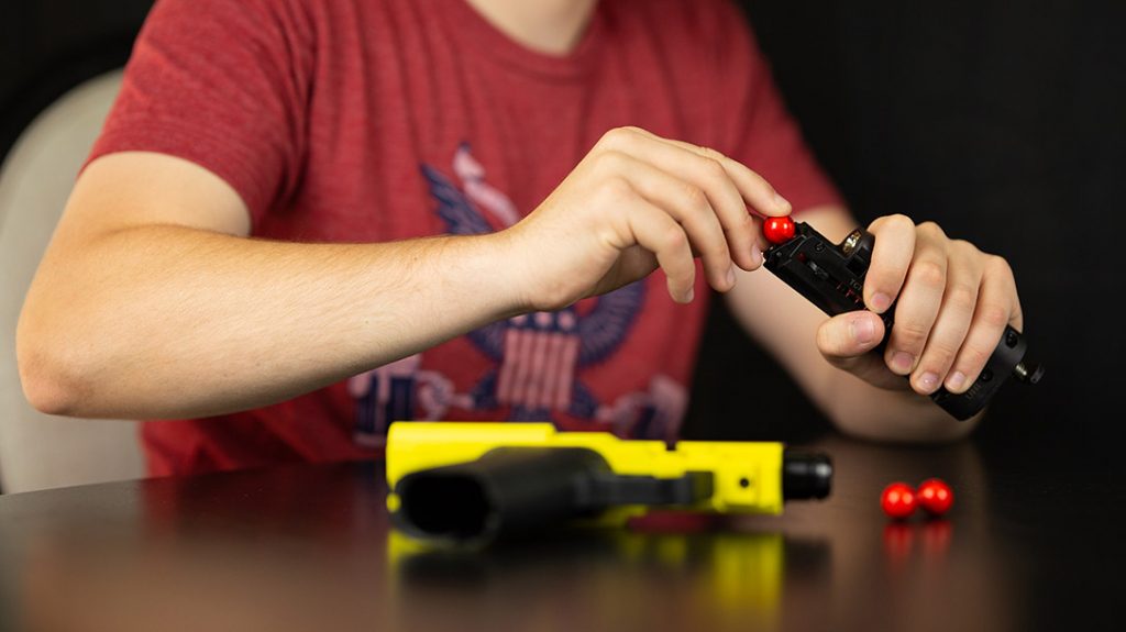 PepperBall ammo loads into the magazine just like traditional handgun ammo.