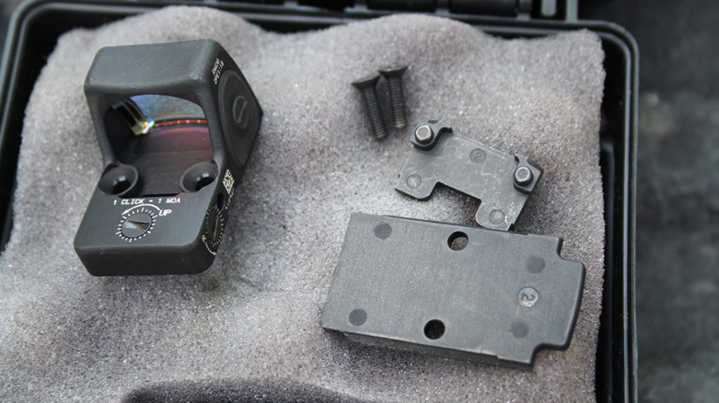 A packet of plates, screws and spacers along with an instruction manual is included with the FN 509 MRD pistol.