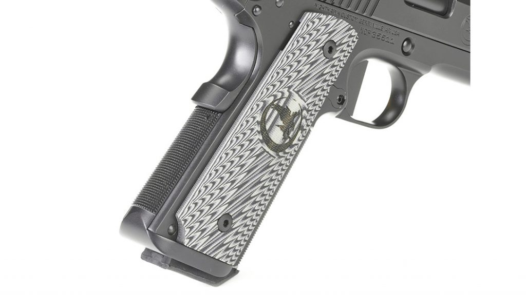 G10 spiral-cut grips boast the Nighthawk logo while offering a comfortable grip while shooting.