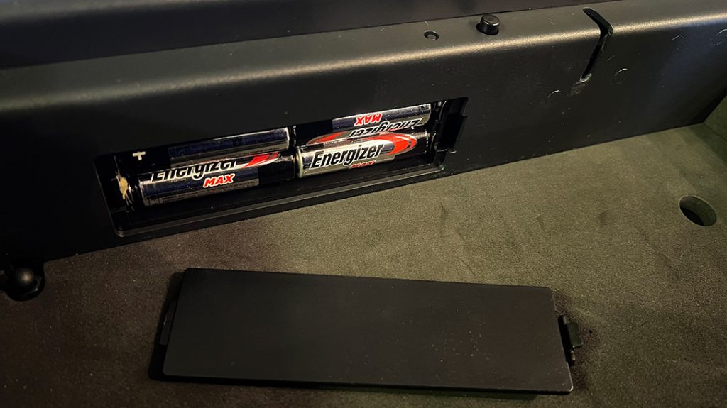 Just inside the front is the battery compartment to house the 4AA batteries.