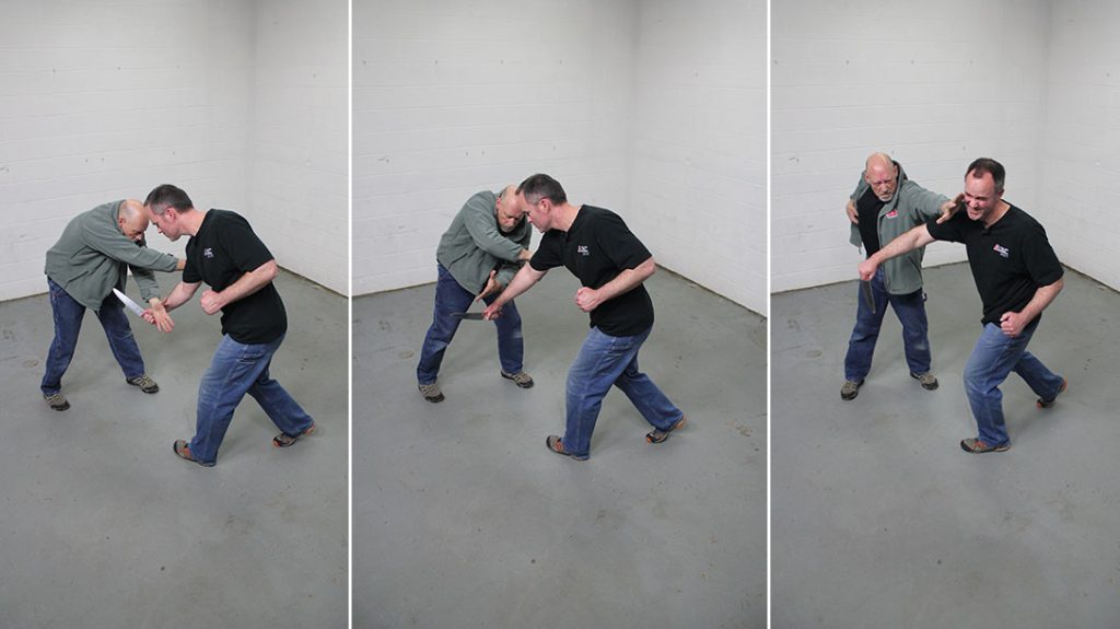 Against a sudden low knife thrust, the defender blocks, deflects the arm, and strikes the assailant in the eyes.