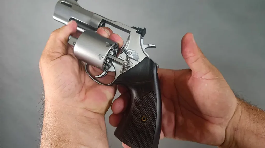 Press the rod to eject the spend shells.