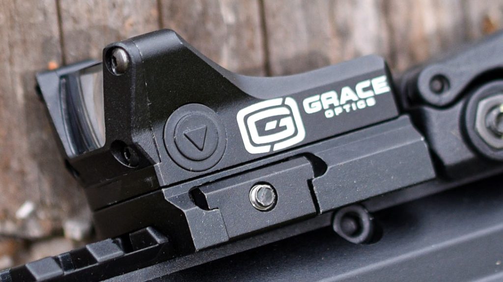 Side mounted rubberized buttons allow for control of the brightness level of the Grace Optics M1.