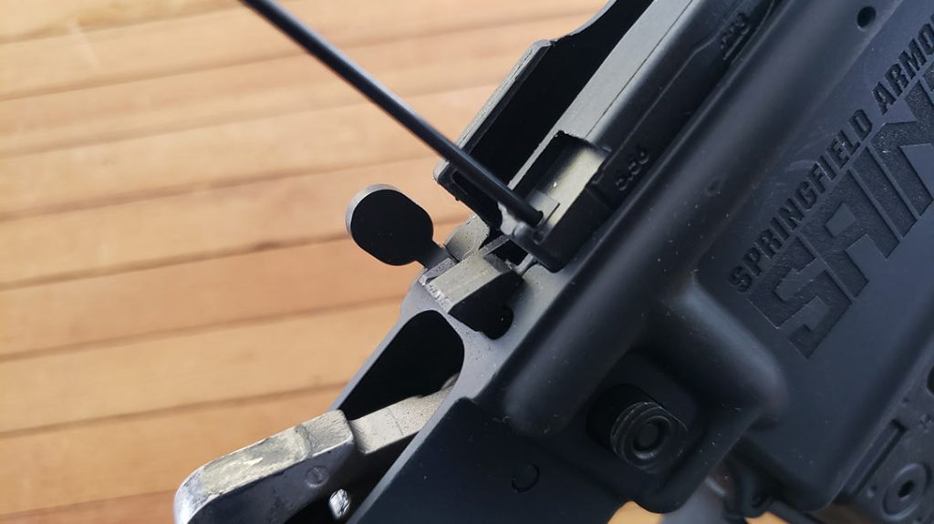 The magazine installs from the top to lock into place.