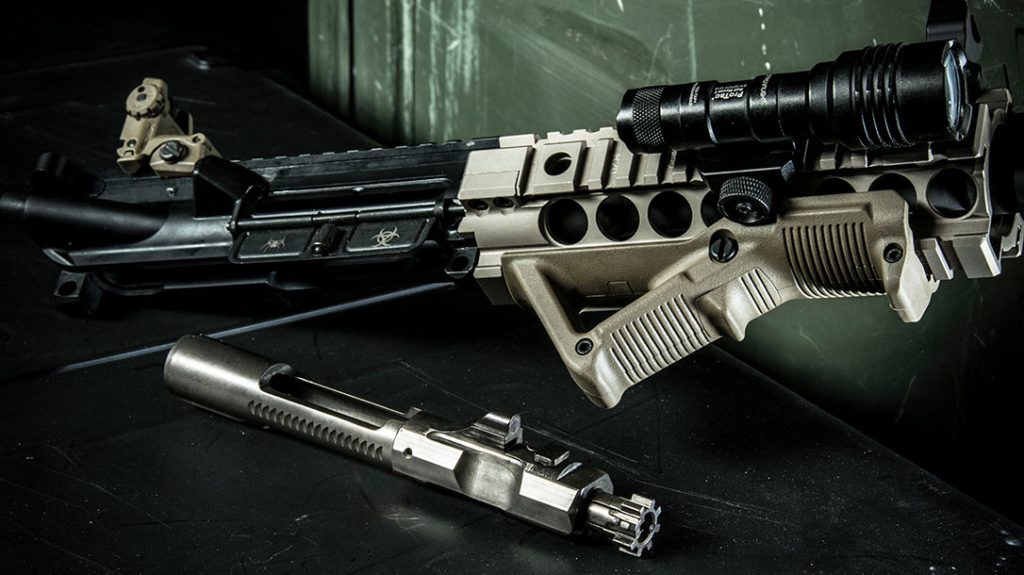 Unlike traditional DI bolt carriers, many piston versions lack a gas key like this one from Spikes Tactical. Settling the Direct Impingement vs Gas Piston argument.