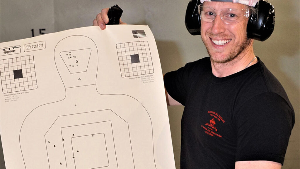 A happy student holds up the results of his training at the Glock Professional BITB course.