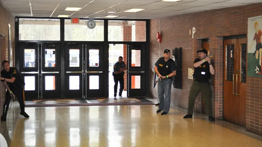 Police arrive at a school shooting