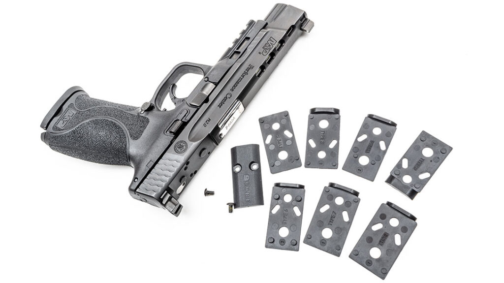 The pistol comes with multiple mounting plates for various different red dot optics.