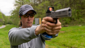 shooting a drill to practice picking up pistol sight faster.