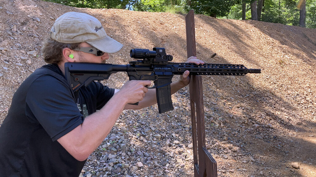 Engaging targets from the kneeling position at EVTC Origin Shooting 3-Gun Range.  
