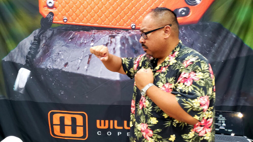 Frank’s right-hand starts to move upward in front of him.