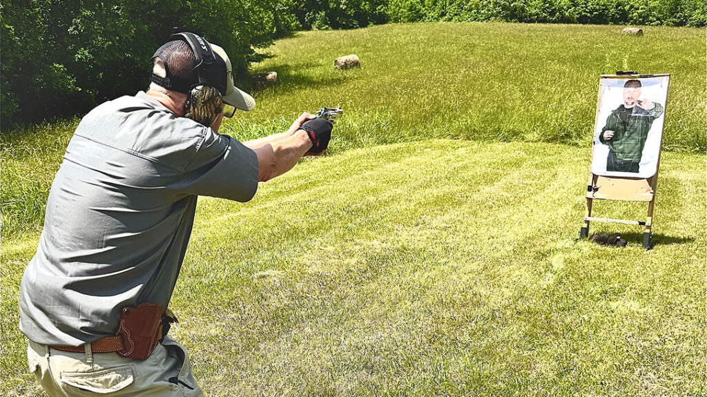 The author running a self-defense drill farther back on the range.