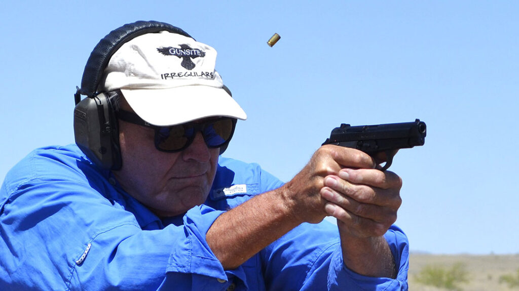 The author running standing drills with the Girsan MC14BDA.