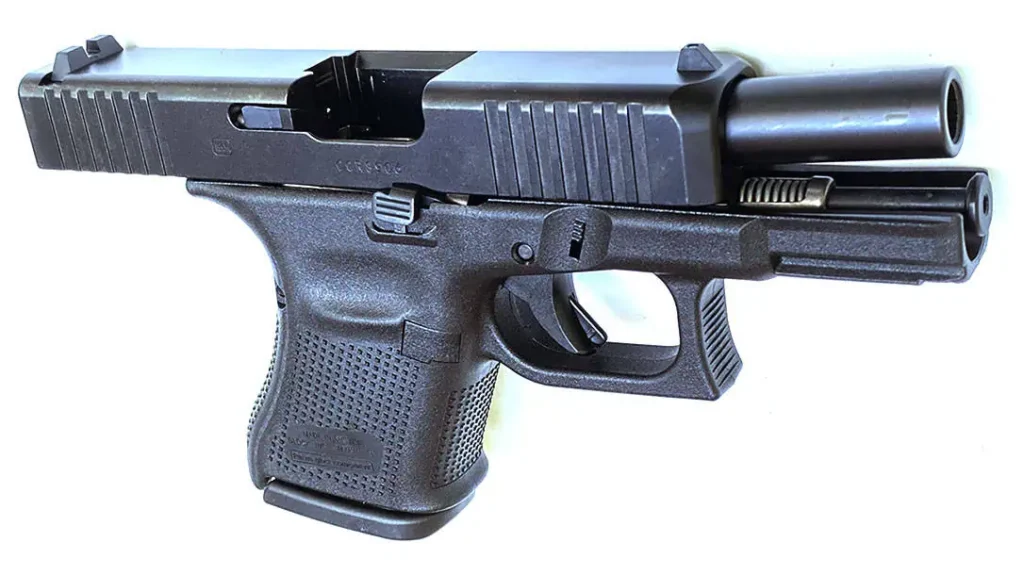 The pistol has ambidextrous slide hold open release levers and a reversible magazine release button.