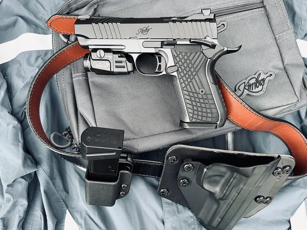 The author’s Kimber KDS9c Rail 1911 came in a box, with the pistol itself inside a gray nylon carrying case with zippered compartments.