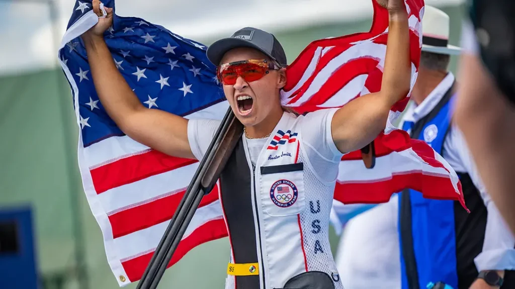Austen Smith celebrates bronze medal performance in Women's Skeet. 