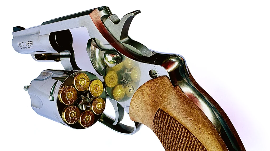 Pulling rearward on the cylinder release latch unlocks the cylinder and allows it to swing out to the left for loading or the ejection of empty cases.