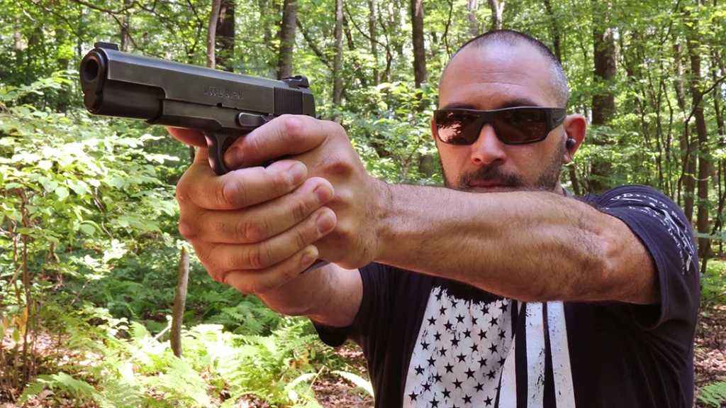 The author shooting his finely tuned Nighthawk Custom Shop 1911.