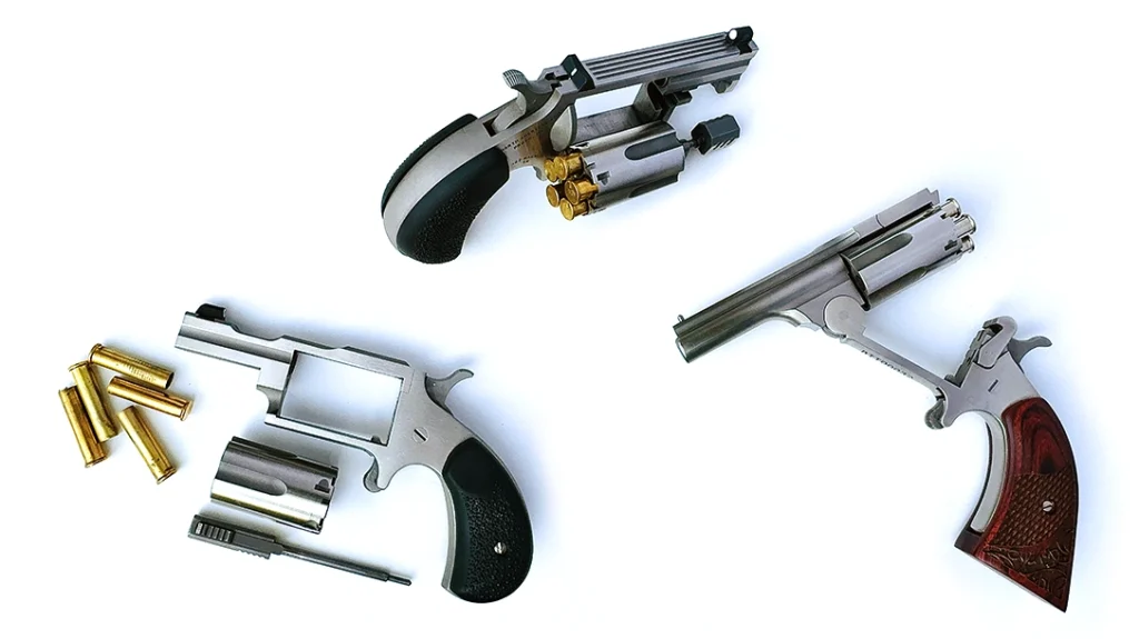 For loading or extracting spent cartridge cases, the hammer is pulled back to the first “click,” the cylinder pin locking block is pulled forward, and the cylinder swung out.