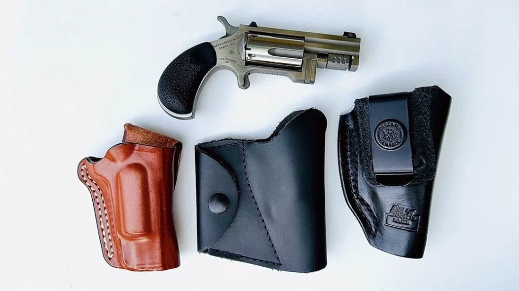North American Arms offers a number of holsters for their mini-revolvers, including the Sentinel; left to right is an OWB belt holster, a pocket model with an ammo pouch, and an IWB rig.