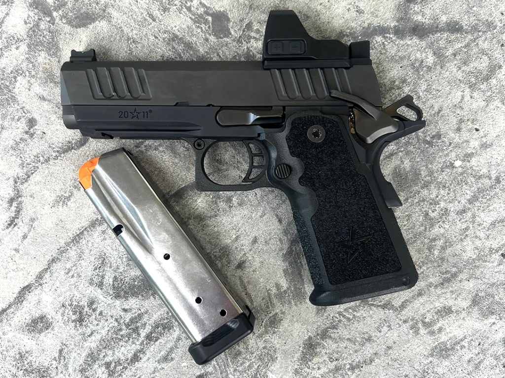 The author opted for the compact grip with 15 round magazine.