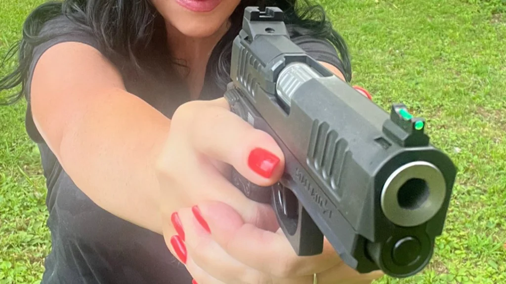 The author shooting the Staccato C using only iron sights.