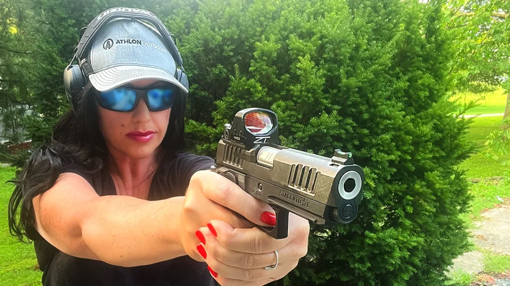 The author shooting the Staccato C with the Thrive red dot from Zero Tech.