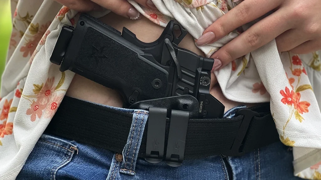 The Tenicor holster and belt helped the author conceal her pistol comfortably.