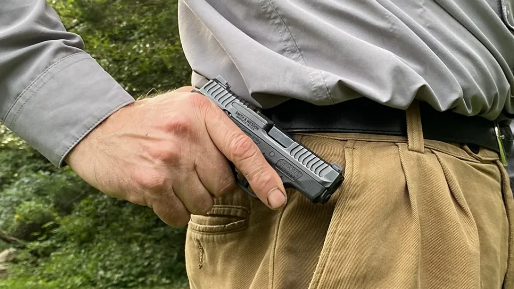 Drawing the Bodyguard 2.0 from the pocket.