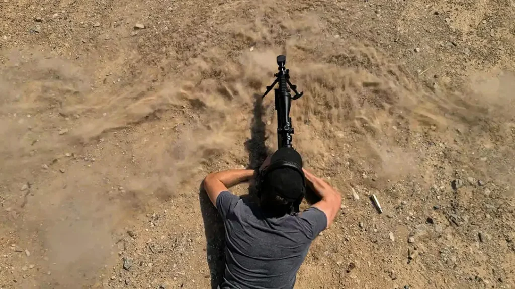 It features a reciprocating barrel.