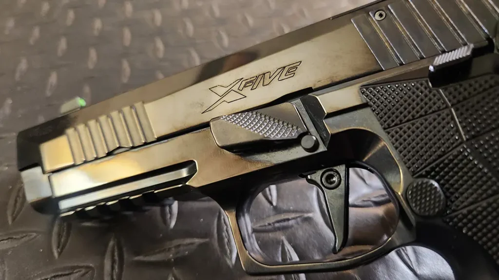 The Sig sport-style takedown lever