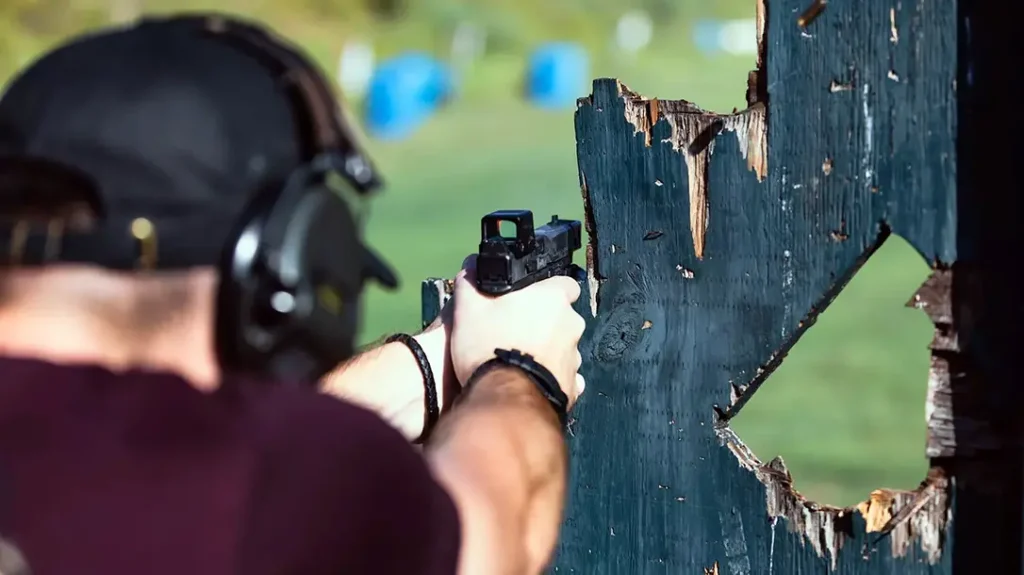Shoot from compromised positions to effectively train with carry optics. 