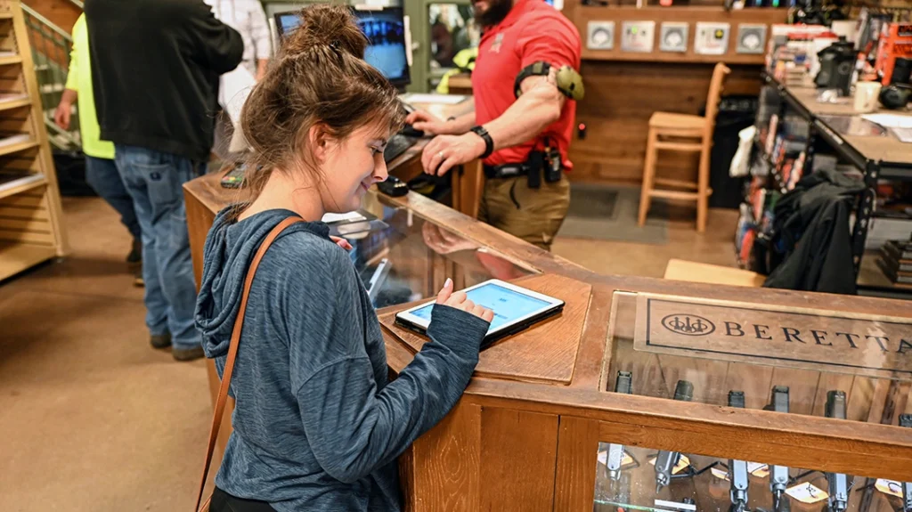 Before entering the indoor gun range, the author had to sign a waiver.