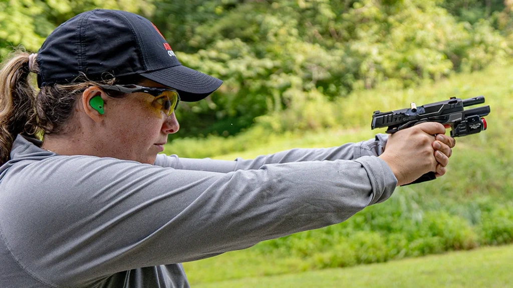 The author shooting the OA Defense Compact Pro.