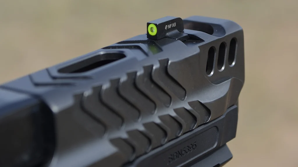 The S&W Performance Center M&P9 M2.0 Metal Carry Comp sports a deep “U” notch that makes it fast to use with the circular Tritium dot front sight.