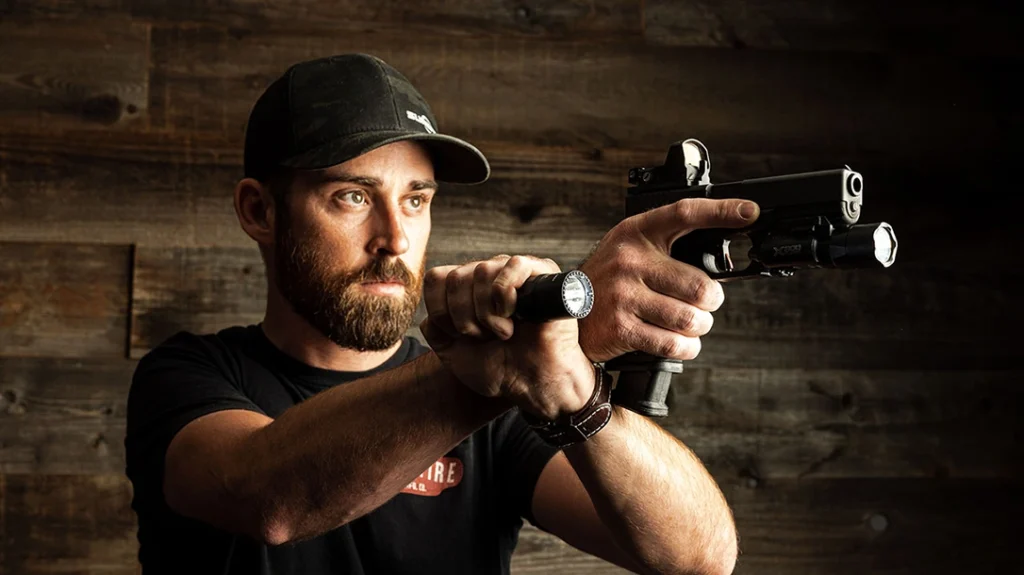 In the Harries Technique, the flashlight is held in an ice pick grip, with your thumb or finger (depending on the flashlight) operating the switch.