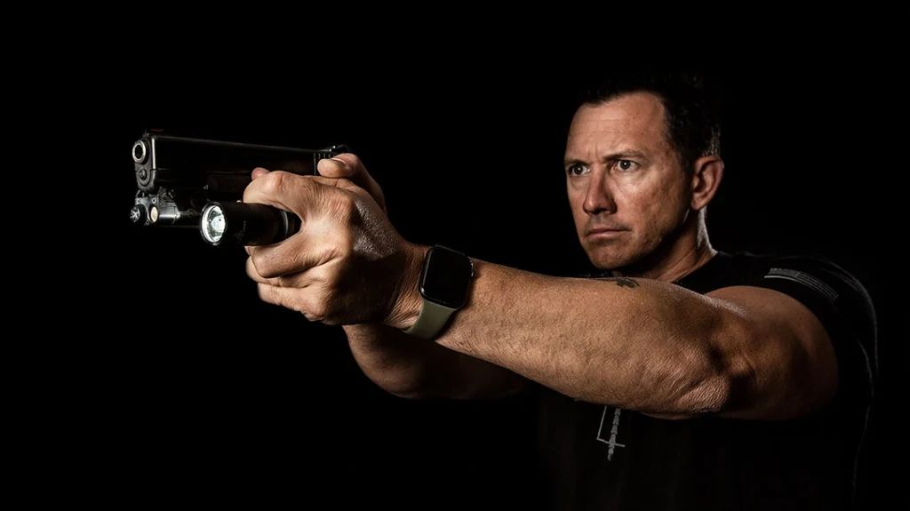 Internationally noted firearms trainer Travis Haley, former Force Recon Marine, private military contractor and the founder of Haley Strategic Partners, demonstrating the Rogers/SureFire Technique.