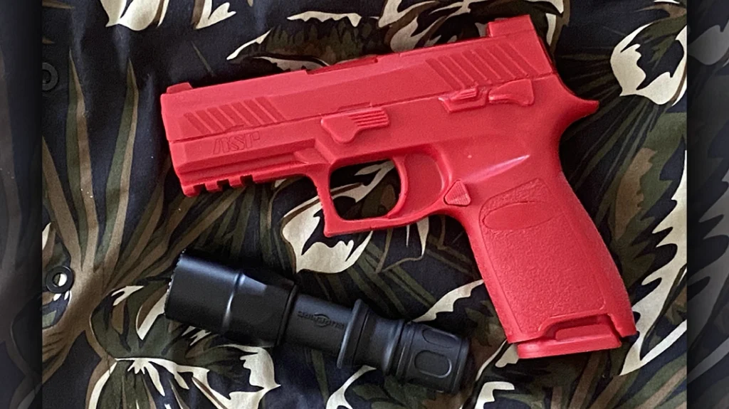 Using inert training guns, such as ASP Red Guns®, is a great way to practice flashlight techniques like the Rogers/SureFire Technique.