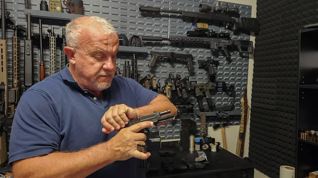 Rack the slide multiple times to clear the chamber. 