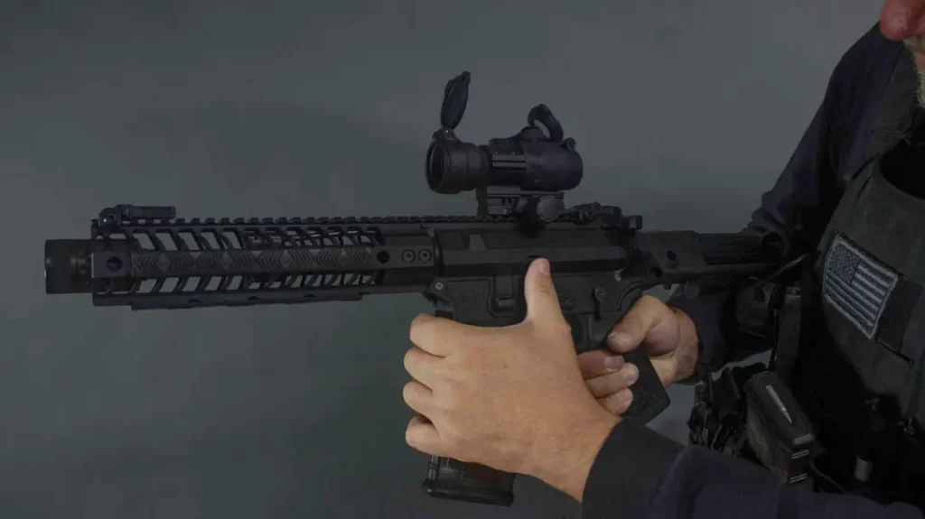 Use your thumb to release the bolt.