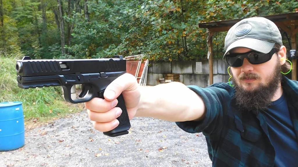 The author shooting the Bear Creek Arsenal Grizzly.