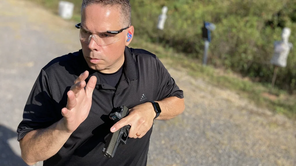 Get a Glock First: The author completing a check 360° with his EDC G17 Gen3.